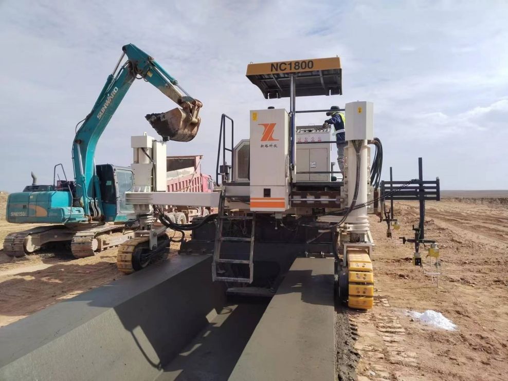 NC1800 drainage ditch slipform paving construction - Jiuquan, Gansu