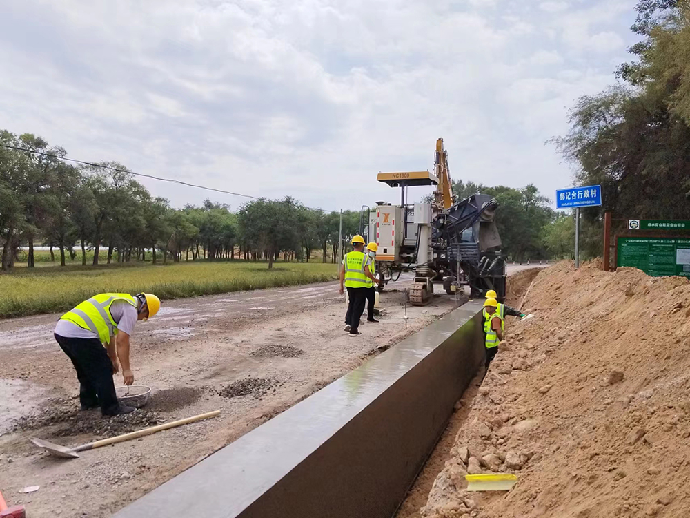 NC1800 slipform paver-Construction of retaining wall sliding formwork